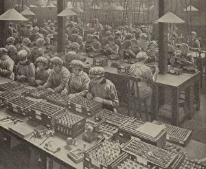 English women munitions workers assembling fuses (b/w photo)