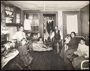 Impoverished Gallery: Family in room in tenement house, c.1910 (gelatin silver print)