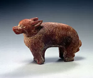 Figure of a dog (amber)