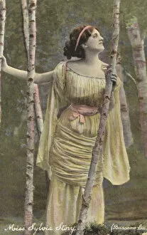 Girl in a birch wood (colour photo)