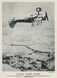 Gloster Gladiator fighter biplane of the RAF flying upside down over the British Gloster Gladiator fighter biplane of the RAF flying upside down over the British