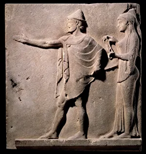 Greek art: plaque of the passage of the Theores: face representing Hermes headdress of Greek art: plaque of the passage of the Theores: face representing Hermes headdress of