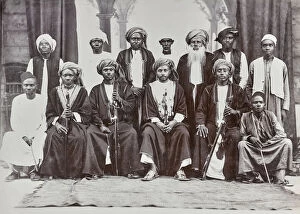 In Costume Gallery: Group portrait of Africans in traditional clothes, Africa, c.1901