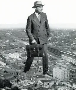 Briefcase Gallery: Guide to Selling - Giant Salesman Strides Through a City, 1928 (screen print)