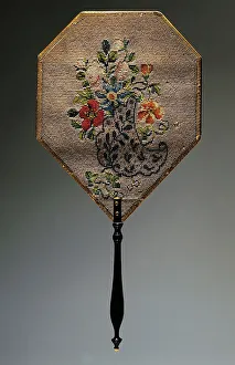 Hand fan, satin covered card with bead embroidered floral motif, wooden handle, length 41 Hand fan, satin covered card with bead embroidered floral motif, wooden handle, length 41