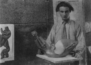 Henri Gaudier-Brzeska with his sculpture Bird Swallowing Fish in Kettles Yard Henri Gaudier-Brzeska with his sculpture Bird Swallowing Fish in Kettles Yard