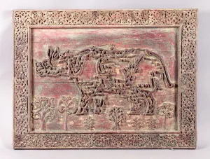 An Indian carved and applied decorative inscription panel An Indian carved and applied decorative inscription panel