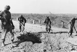 Indian soliders searching for mines along a dirt road, 1941 (b/w photo) Indian soliders searching for mines along a dirt road, 1941 (b/w photo)