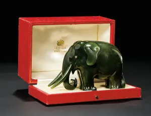 A jewelled nephrite model of an elephant, with diamond-set eyes, c A jewelled nephrite model of an elephant, with diamond-set eyes, c