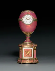 Jewelled vari-coloured gold-mounted and enamelled egg on plinth Jewelled vari-coloured gold-mounted and enamelled egg on plinth