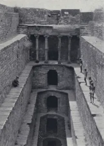 Well jumpers beside an eighty foot deep well built by the Mughals, India (b/w photo) Well jumpers beside an eighty foot deep well built by the Mughals, India (b/w photo)
