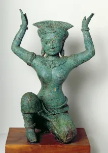 Kneeling feminine figure used to support a mirror, from Angkor Thom (bronze) Kneeling feminine figure used to support a mirror, from Angkor Thom (bronze)