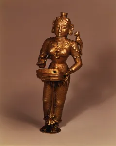 Lamp in the form of Goddess of Fortune, South Indian, early 19th century (brass) Lamp in the form of Goddess of Fortune, South Indian, early 19th century (brass)