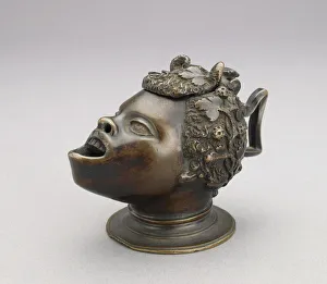 Lamp (or inkwell) in the form of the head of an African boy Lamp (or inkwell) in the form of the head of an African boy