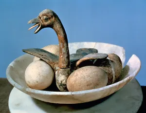 Lid of an alabaster jar decorated with a bird in a nest containing eggs Lid of an alabaster jar decorated with a bird in a nest containing eggs