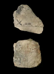 Limestone ostraca with humorous sketches in red and black ink Limestone ostraca with humorous sketches in red and black ink