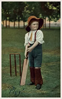 Little boy playing cricket (photo)