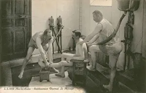 Man being massaged by two men in the thermal bath at Aix les Bains (b/w photo) Man being massaged by two men in the thermal bath at Aix les Bains (b/w photo)