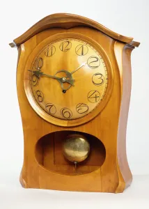 A mantel clock, 1899 (mahogany, fruitwood, brass) A mantel clock, 1899 (mahogany, fruitwood, brass)