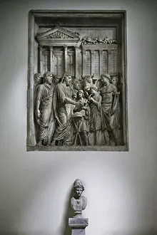 Marcus Aurelius sacrificing in front of the temple of Zeus (marble relief) Marcus Aurelius sacrificing in front of the temple of Zeus (marble relief)