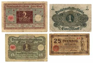 A two mark banknote, two one mark banknotes and a twenty five pfennig banknote A two mark banknote, two one mark banknotes and a twenty five pfennig banknote