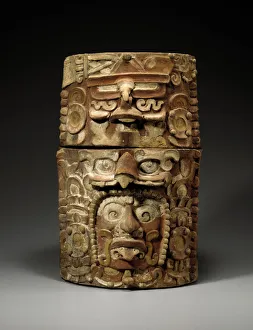 A Mayan cache vessel carved on one side with the face of Sun God, Kinich Ahaw Or G-I, c A Mayan cache vessel carved on one side with the face of Sun God, Kinich Ahaw Or G-I, c