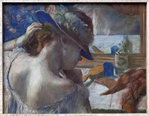 In front of the mirror. Work of Edgar Degas (1834-1917), pastel around 1889 In front of the mirror. Work of Edgar Degas (1834-1917), pastel around 1889