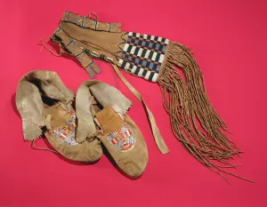 Moccasins and gaiters, Plains Indians, c.1820 (leather & beads) Moccasins and gaiters, Plains Indians, c.1820 (leather & beads)