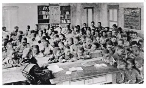 A monk teaching a class in French speaking Africa, before 1914 (b/w photo) A monk teaching a class in French speaking Africa, before 1914 (b/w photo)