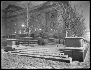 Night view of the northeast corner of the steps outside the main branch of the New York Night view of the northeast corner of the steps outside the main branch of the New York