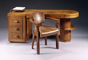 An oak desk and chair, c. 1940 (oak, leather)
