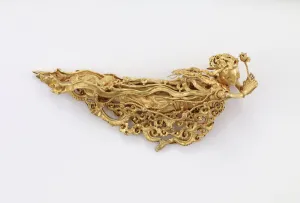 One of a pair of Apsarases, Buddhist heavenly beings (gold) One of a pair of Apsarases, Buddhist heavenly beings (gold)