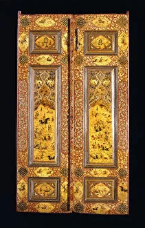 A pair of lacquer panelled doors, painted with Safavid style scenes of battle