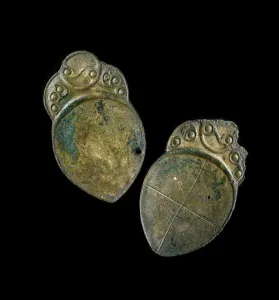 Pair of spoons with cast decoration, from a site at Penbryn, Ceredigion, Wales Pair of spoons with cast decoration, from a site at Penbryn, Ceredigion, Wales