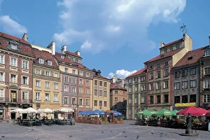 Patios in front of buildings, Old Town Market Square, Mazowieckie, Warsaw, Poland Patios in front of buildings, Old Town Market Square, Mazowieckie, Warsaw, Poland