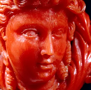 Pendent of a classical head and anaphora in mediterranean coral and gold (detail) Pendent of a classical head and anaphora in mediterranean coral and gold (detail)
