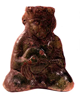 Persian art: vase in the shape of a mandolin player 13th century Munich Persian art: vase in the shape of a mandolin player 13th century Munich