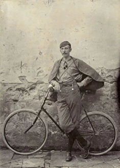 Bicyle Gallery: Portrait of a man with bicycle, 1890-1900