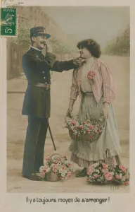 Postcard of a French policeman with a flower girl, sent in 1913 (hand-coloured photo) Postcard of a French policeman with a flower girl, sent in 1913 (hand-coloured photo)