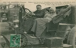 Postcard of Madame Anne Brugere in a motor car with her daughter aged 73, Les Herbiers, sent in 1913 (b/w photo)