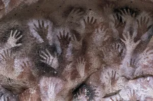 Rock Painting Gallery: Prehistoric art : cave with hand prints 'Cave of the Hands'