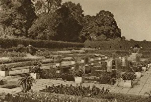 The quiet of the Dutch Garden at Kensington Palace guarded by locked gates (b/w photo) The quiet of the Dutch Garden at Kensington Palace guarded by locked gates (b/w photo)