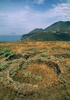 Restored lower walls of huts in prehistoric site of Capo Graziano, Filicudi Island Restored lower walls of huts in prehistoric site of Capo Graziano, Filicudi Island