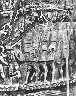 Roman Soldiers using the testudo method during an attack, detail from the column of Marcus Aurelius