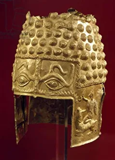 Romanian art: gold helmet from the treasure of Sacochul hare. Late bronze era. Romania Romanian art: gold helmet from the treasure of Sacochul hare. Late bronze era. Romania