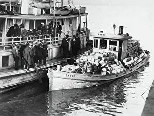 Means Of Conveyance Gallery: Rumrunner « Dante » anchored at the wharf with alcohol aboard and guarded by prohibition agents