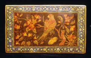 Olden Time Gallery: A Safavid dynasty lacquer bookcover depicting a parrot perching on the branch of an apple blossom
