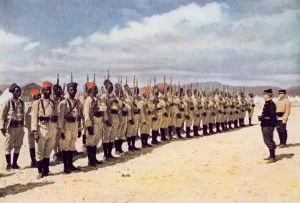 Senegalese Infantry on the beach at Frejus (after a coloured photograph) Senegalese Infantry on the beach at Frejus (after a coloured photograph)