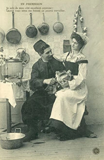 Servant girl sitting on man's knee in the kitchen (b / w photo)