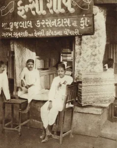 Shop selling cloth, Bombay, India (b/w photo) Shop selling cloth, Bombay, India (b/w photo)